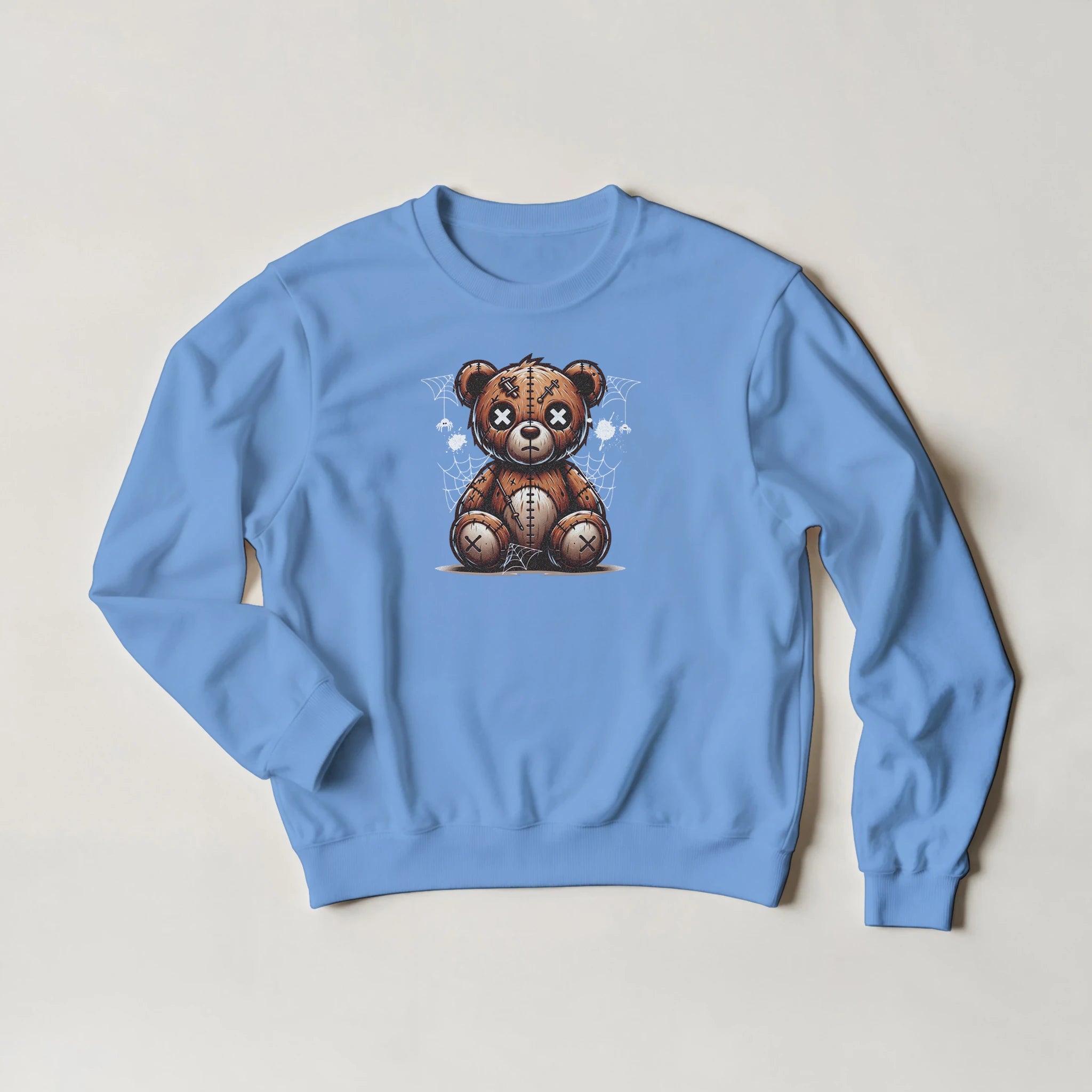 Blue cotton-blend men's sweatshirt with a stitched-stressed teddy bear graphic and spider-web background.