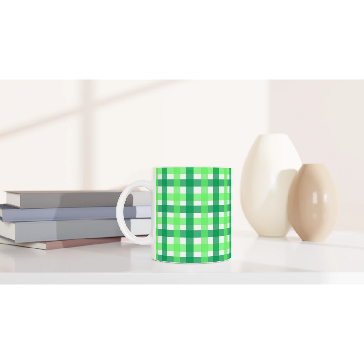 Green gingham ceramic mug with white handle, a cute checkered coffee cup on a desk.