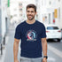 Man wearing navy USA graphic T-shirt with Statue of Liberty and 4th of July Independence Day design.