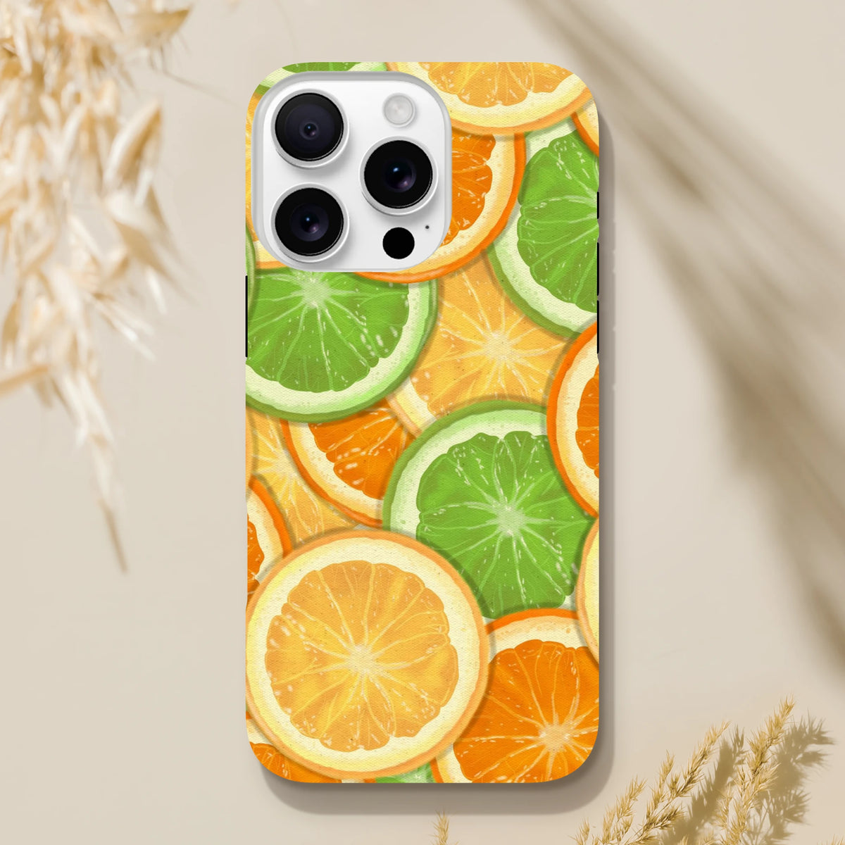 Vibrant orange and lime slice pattern phone case for iPhone 13-16. Durable TPU citrus cover with shock-absorbing protection for daily streetwear.