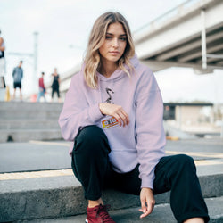 Lavender vintage cassette tape graphic hoodie for women, featuring a retro music design and relaxed fit for streetwear styling.