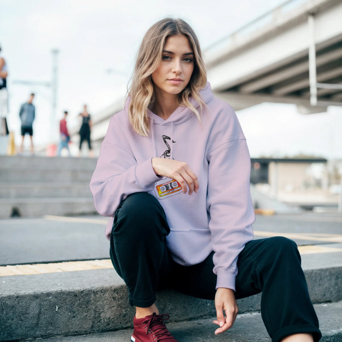 Lavender vintage cassette tape graphic hoodie for women, featuring a retro music design and relaxed fit for streetwear styling.