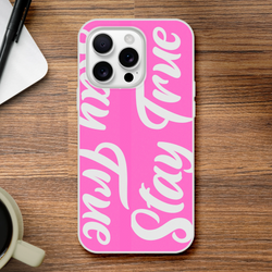 Pink Stay True iPhone case for 13-16 with bold white slogan, streetwear vibe, and protective cover.