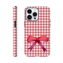Red gingham iPhone case with a pink coquette bow, featuring a tough wraparound print for iOS 13-16 devices.