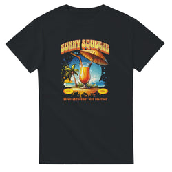 Tropical cocktail graphic on black cotton-blend T-shirt with a palm tree, umbrella, and beach scene.