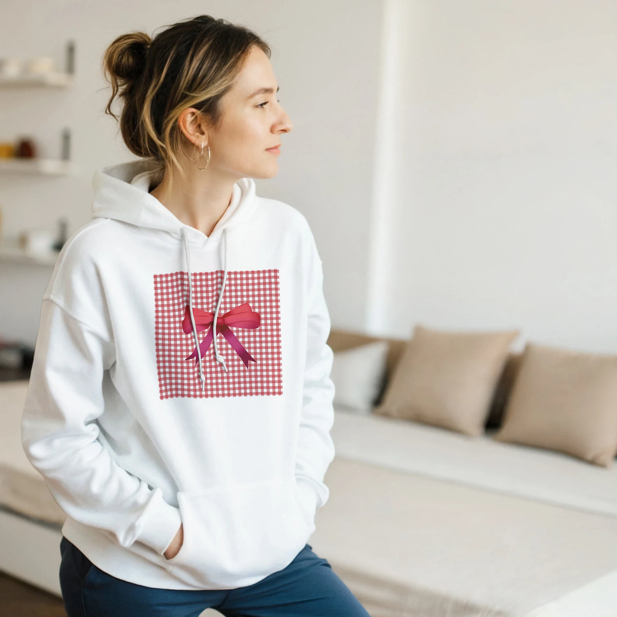 White hoodie featuring a red gingham square print with a pink bow detail, embodying a cute coquette aesthetic.