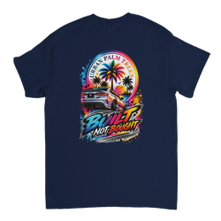 Navy blue t-shirt back featuring colorful custom car graphic with palm trees, sunset, and bold Built Not Bought typography.