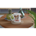 Cute dog mug gift for her: white ceramic mug with two puppies wearing pink bows.