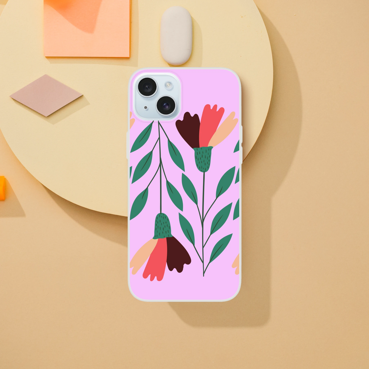 Pastel pink floral iPhone case for 13–16 with leafy bouquet design.