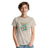 Model wearing Paradise women's graphic T-shirt in beige with tropical floral print; soft cotton blend, crew neck.