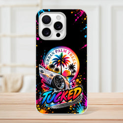 Tucked Stance car culture iPhone case featuring lowered silver car, colorful palm trees, and Urban Palm Trees sunset art.