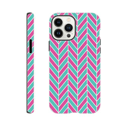 Pink and turquoise herringbone iPhone case featuring a bold geometric chevron pattern and tough dual-layer shock-absorbing protection.