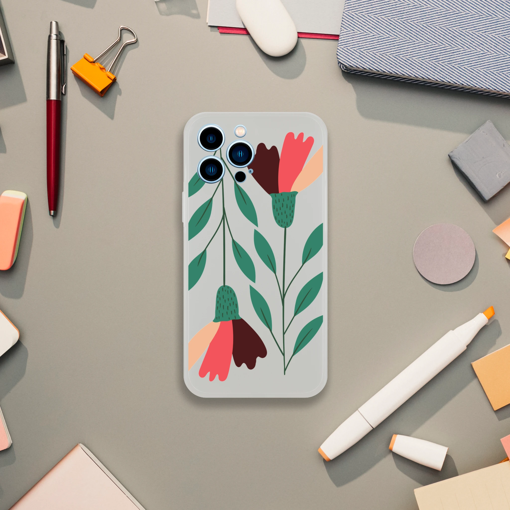 Floral transparent slim protective case for iPhone 13-16 with green leaves and colorful petals on light gray background