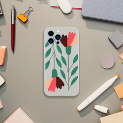 Floral transparent slim protective case for iPhone 13-16 with green leaves and colorful petals on light gray background