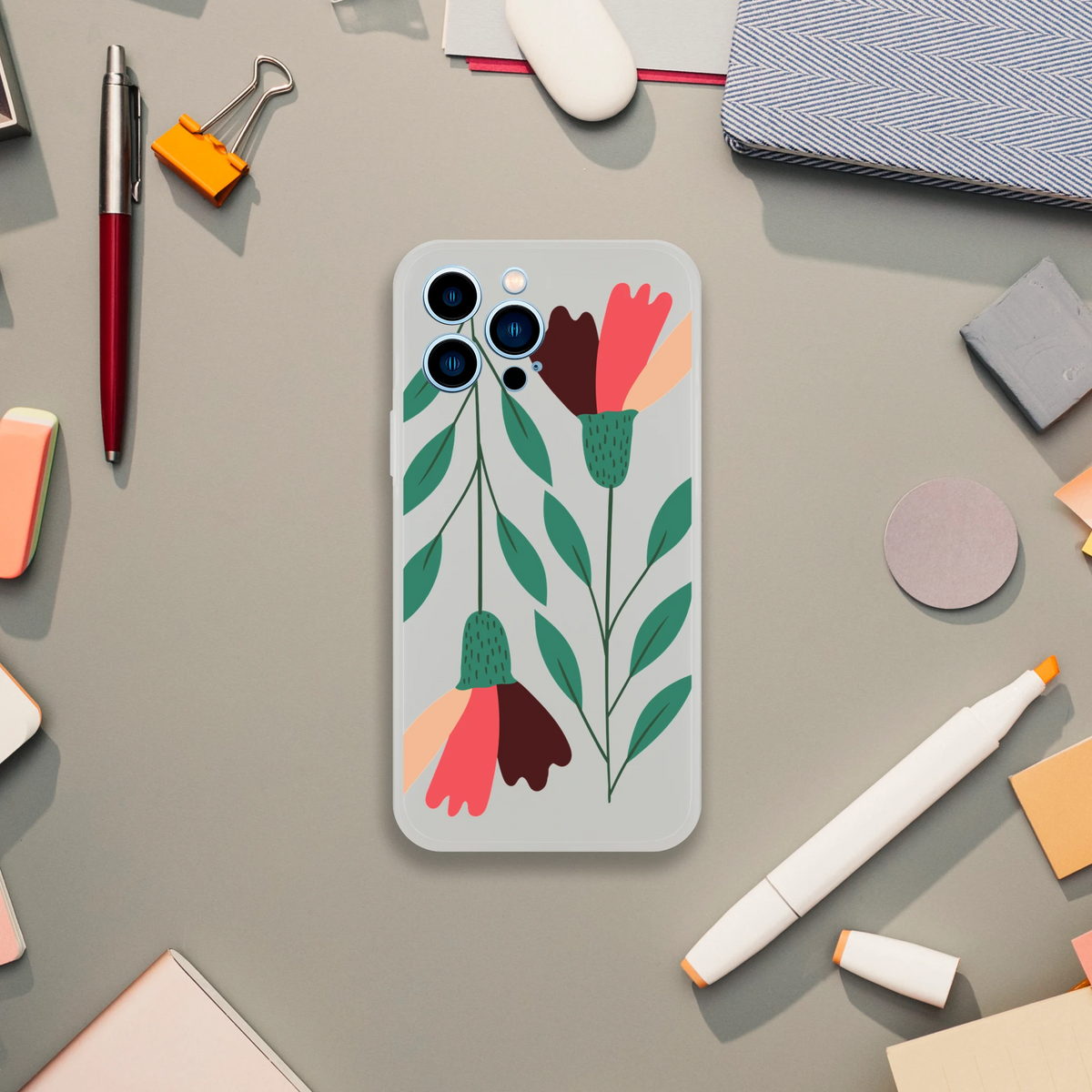 Floral transparent slim protective case for iPhone 13-16 with green leaves and colorful petals on light gray background