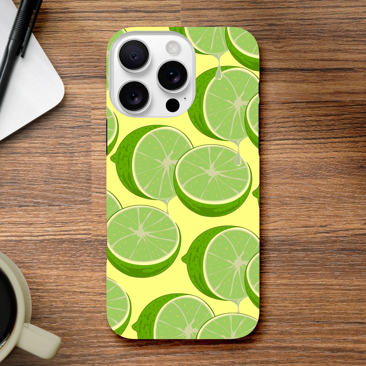 Fresh green lime slice pattern on a tough iPhone case providing durable protection and vibrant citrus style.