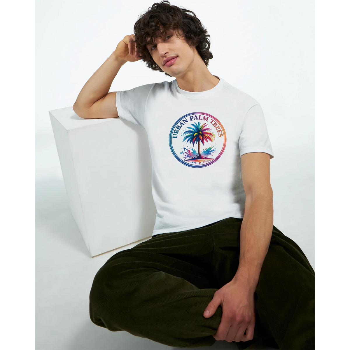 Man wearing white Urban Palm Trees Tee for Men with colorful palm tree graphic.