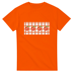 Orange women's tee featuring a peach graphic on a gingham panel.