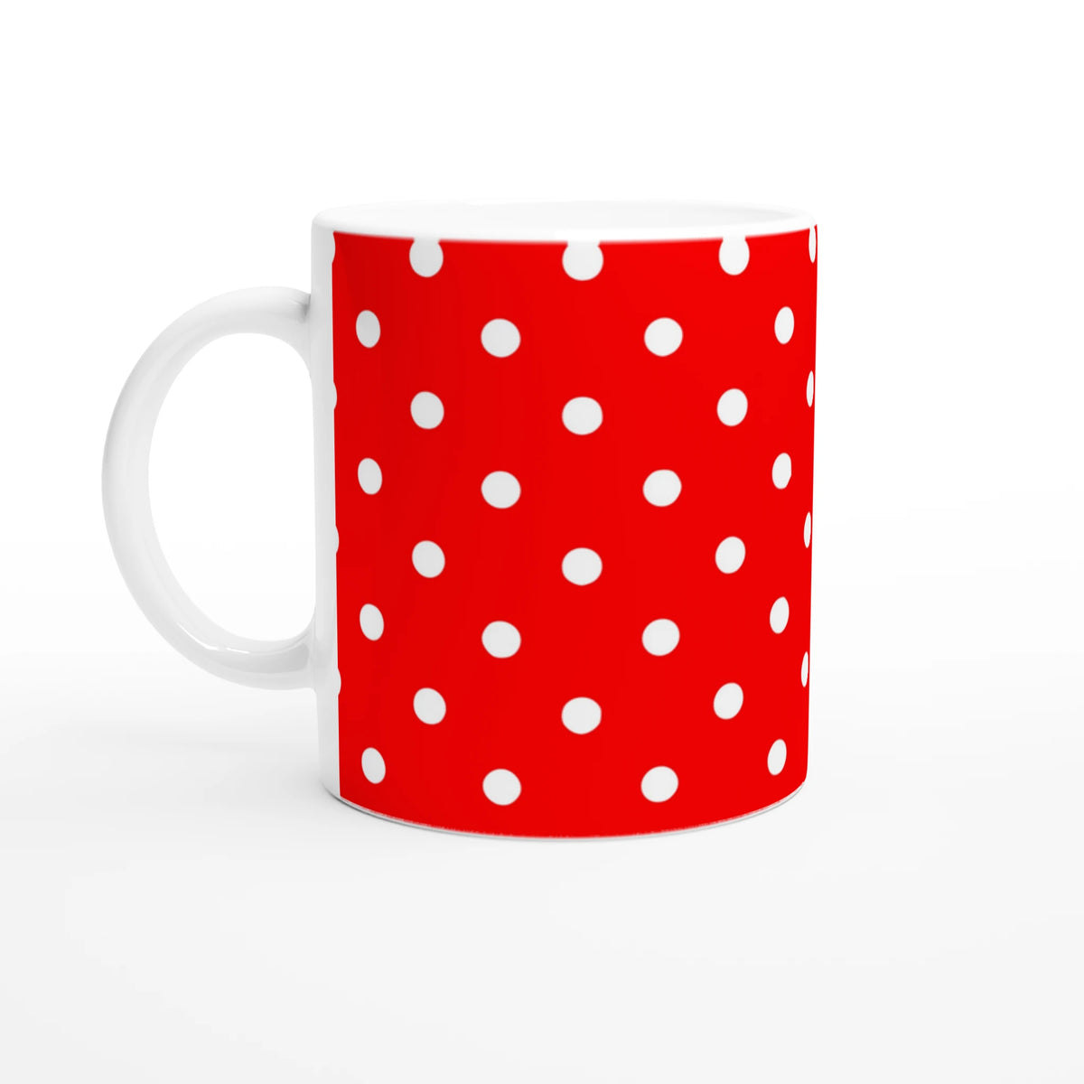 Red ceramic mug with white polka dots. Cute spotty coffee cup for daily brews, office use, or gifting.