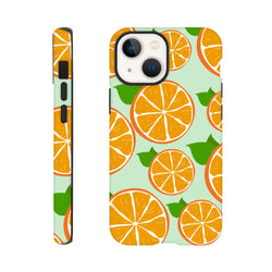 Tough iPhone case featuring a vibrant sliced orange fruit pattern on mint green with reinforced bumpers for drop protection.