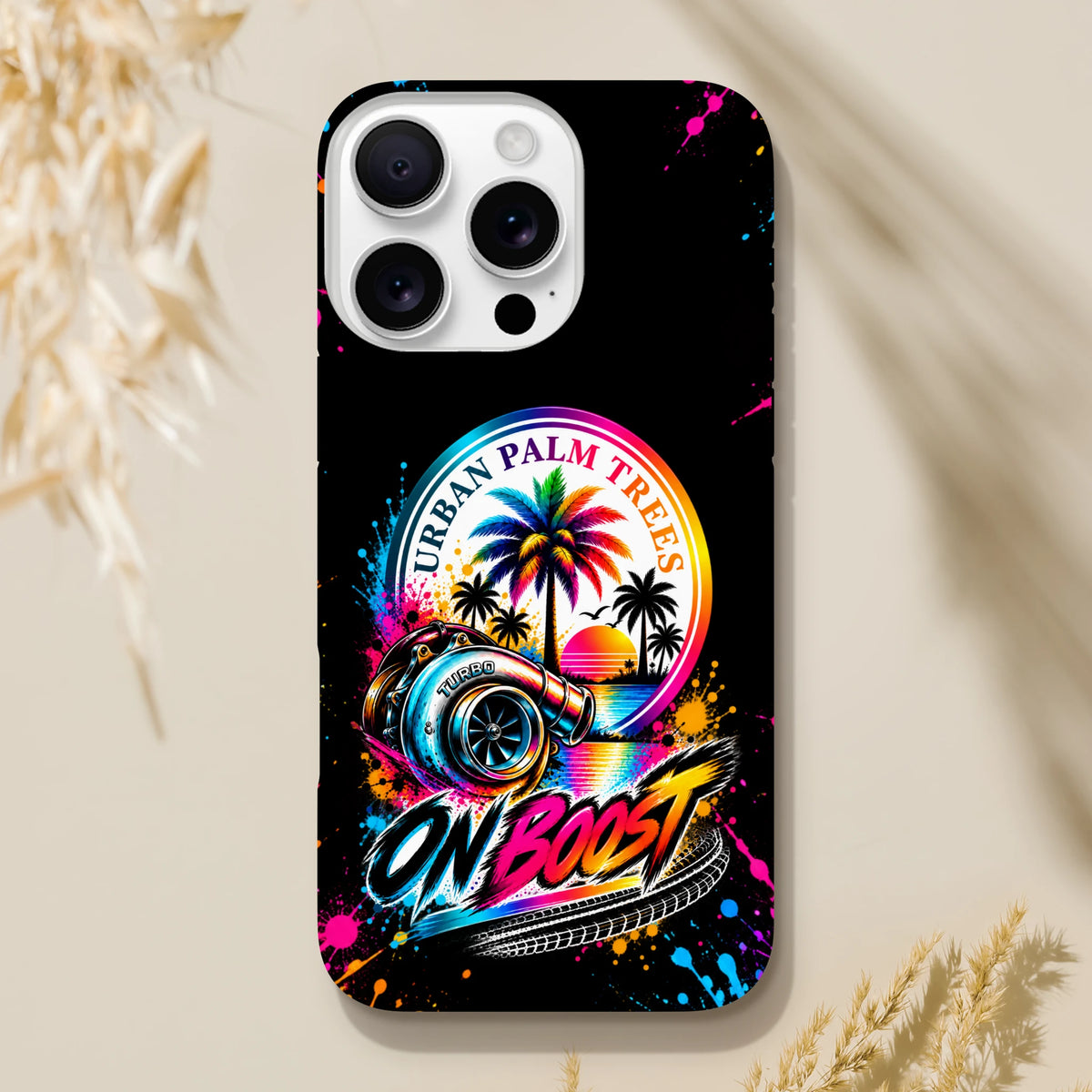 Black iPhone case featuring a colorful turbocharger, rainbow palm trees, and "On Boost" text in a modified car culture design.
