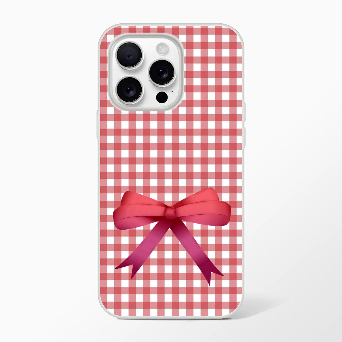 Red gingham iPhone case for iPhone 13–16 with a pink bow in a cute coquette aesthetic.