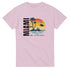 Pink Miami graphic T-shirt featuring palm trees and a sunset beach scene on soft cotton-blend fabric.