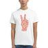White heavyweight cotton-blend Peace graphic tee with pink peace-hand design formed by words.