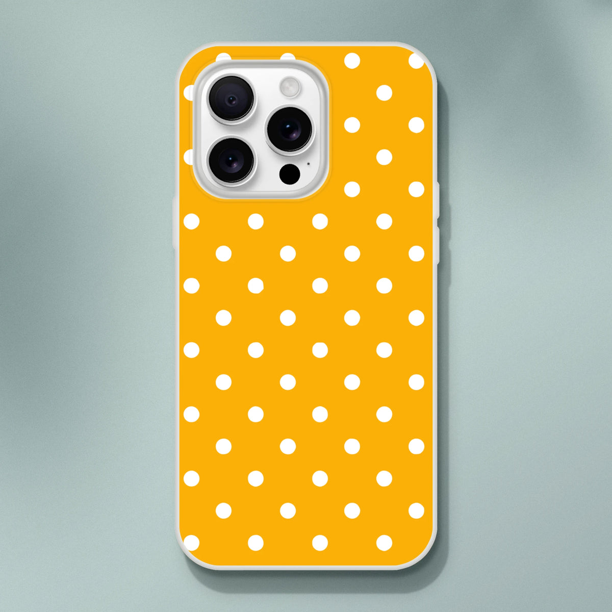 Retro orange and white polka dot iPhone case with slim matte finish and shock-absorbing TPU protection for daily commute.