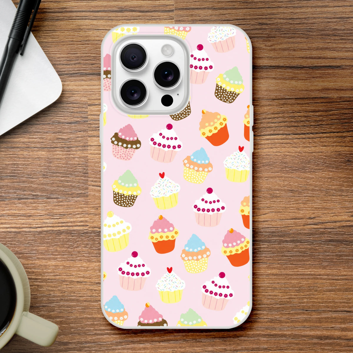Pastel pink cupcake-pattern iPhone case for 13-16, slim matte cover with cute sweet-treat design.