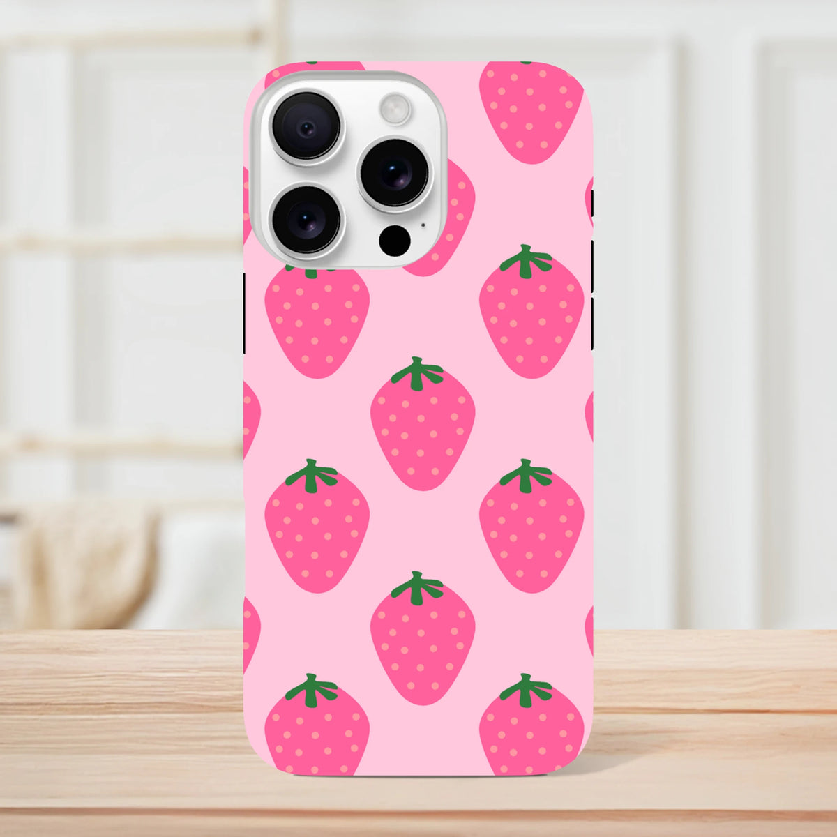 Pink strawberry pattern iPhone case with cute fruit design and tough protection for reliable defense.