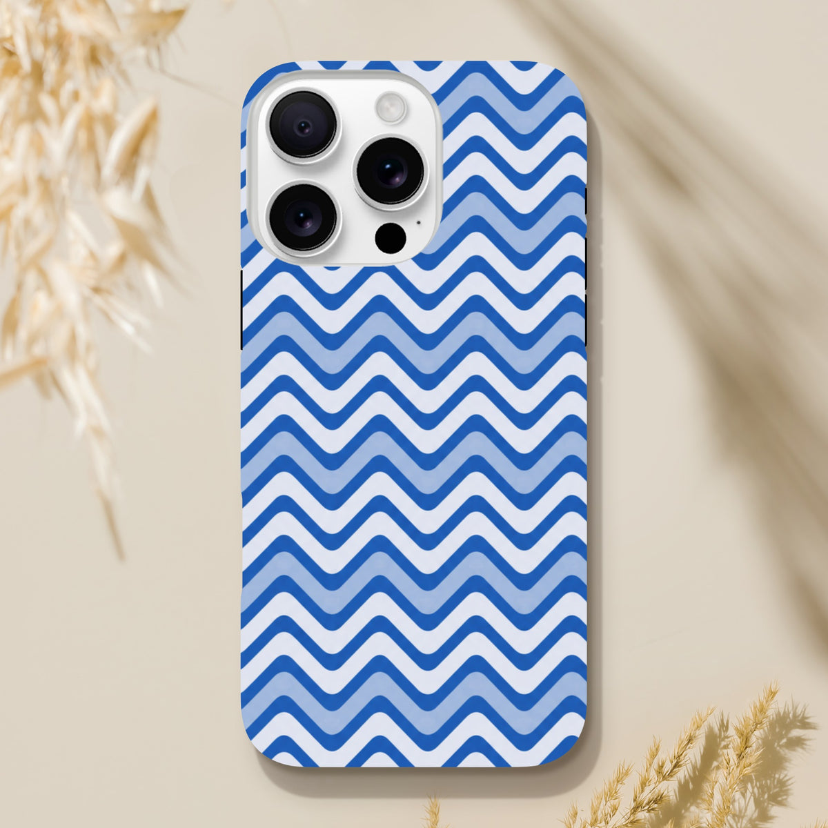 Blue & white retro zigzag iPhone case with glossy finish and tough shock-absorbing TPU protection for daily impact resistance.
