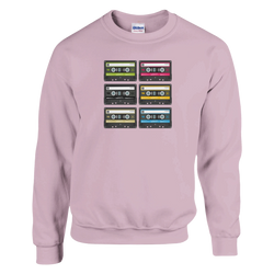 Pink crewneck sweatshirt featuring a grid of six colorful retro cassette tapes with 90s music graphics.