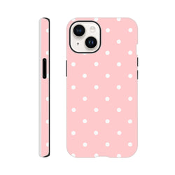 Pastel pink tough iPhone case with white polka dots, featuring shock-absorbing TPU and dual-layer protection for drop resistance.