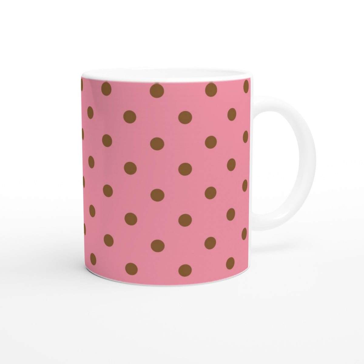 Pink & brown polka dot ceramic mug. Retro spotty coffee cup adding charm to desks, dorms, or gifting for daily coffee and tea.