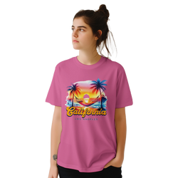 Young woman wearing pink retro California tee with palm trees and sunset graphic