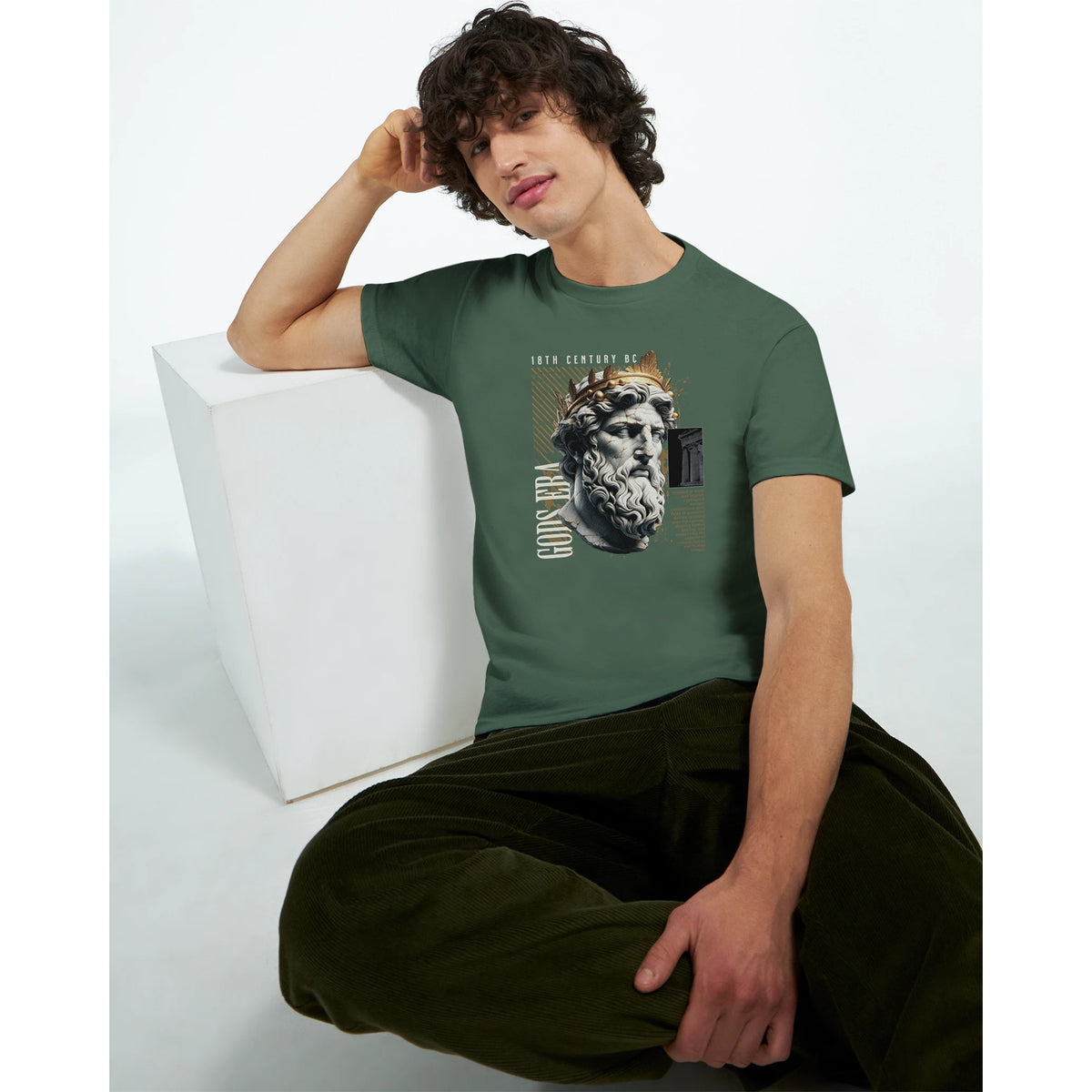 Man wearing Gothic Gods graphic T-shirt in green cotton blend with ancient statue artwork.
