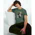 Man wearing Gothic Gods graphic T-shirt in green cotton blend with ancient statue artwork.