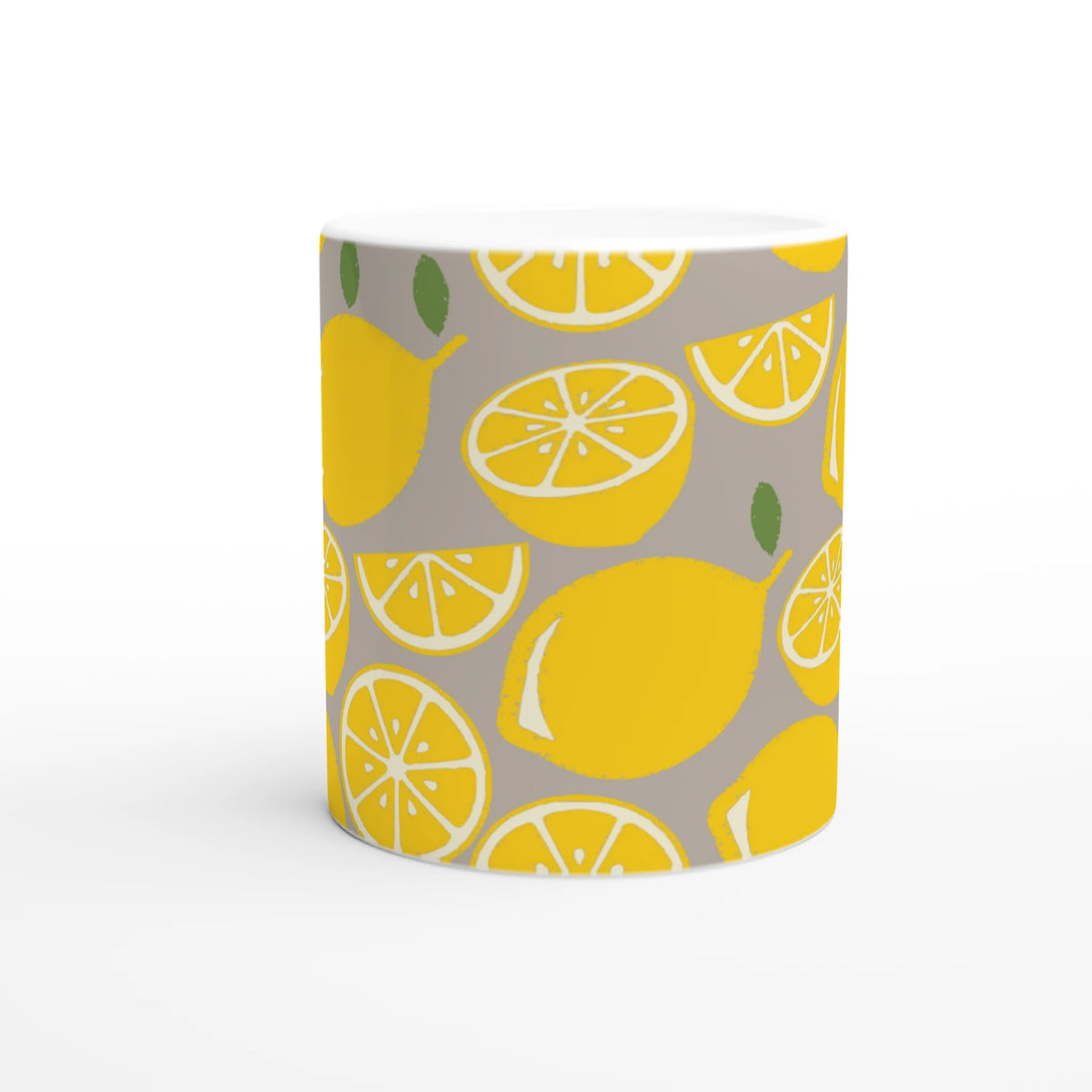 Cute Lemon Mug with bright yellow lemon slices on a gray background, ceramic coffee or tea cup.