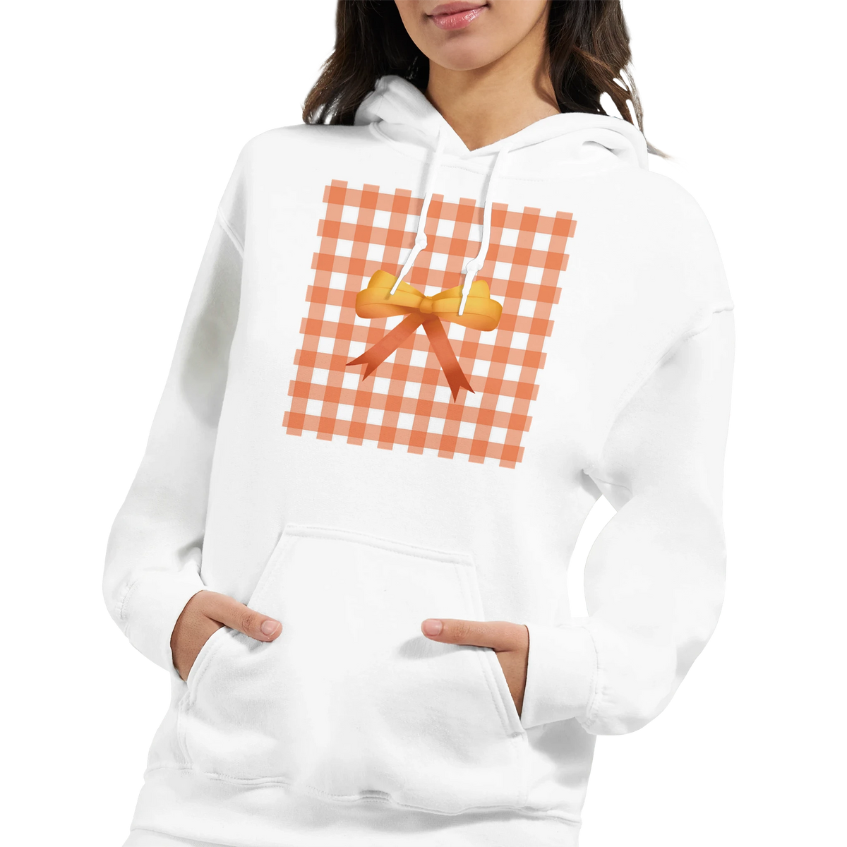 White pullover hoodie featuring an orange gingham square design with a central yellow bow, embodying a cute coquette aesthetic for women.