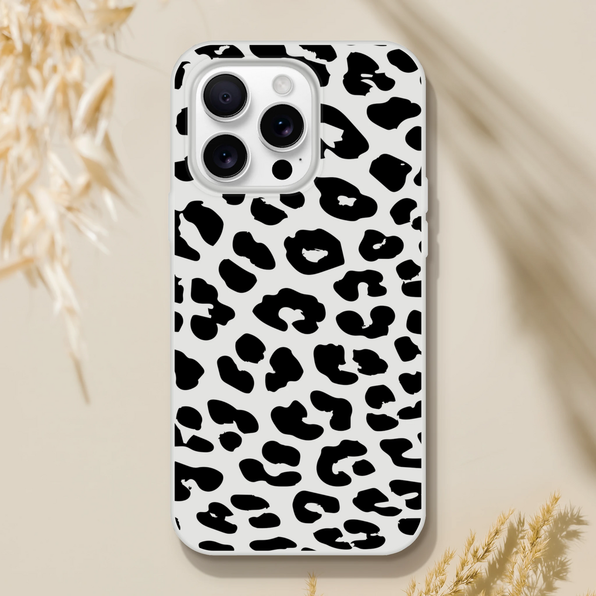 Cow-print iPhone case for 13-16, bold animal aesthetic phone cover.