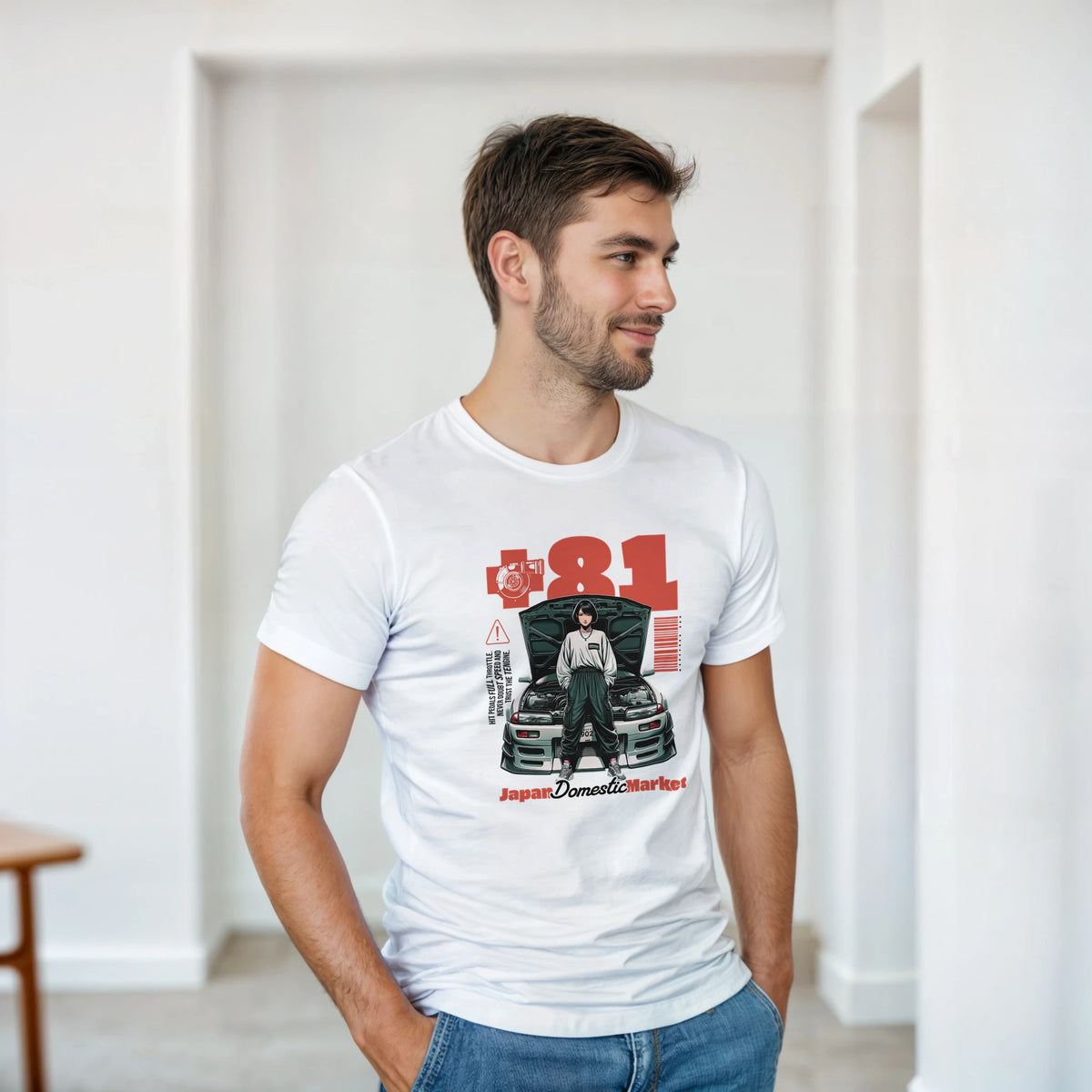 White men's graphic tee featuring vintage JDM car culture art, red +81 text, and Japan Domestic Market streetwear design.