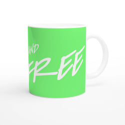 Cute Wild And Free Mug: green gradient ceramic coffee cup with white script slogan and comfy handle.