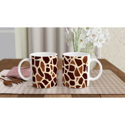 Two brown giraffe-print mugs with white handles on a table, Safari Animal Coffee Cup.
