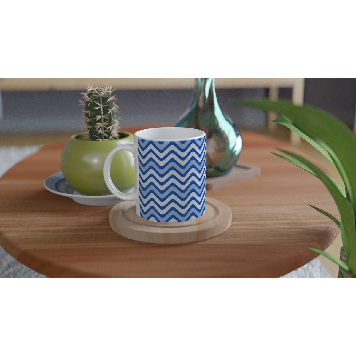 Retro blue wavy stripe ceramic mug on wooden coaster beside green cactus on wood table.