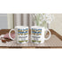 Two white ceramic mugs with retro 90s arcade 'Game Over' print and 'CONTINUE? 10 INSERT COIN' on a wooden table.