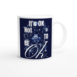 Glossy white ceramic mug featuring navy panel with It's OK Not To Be OK and floral design.