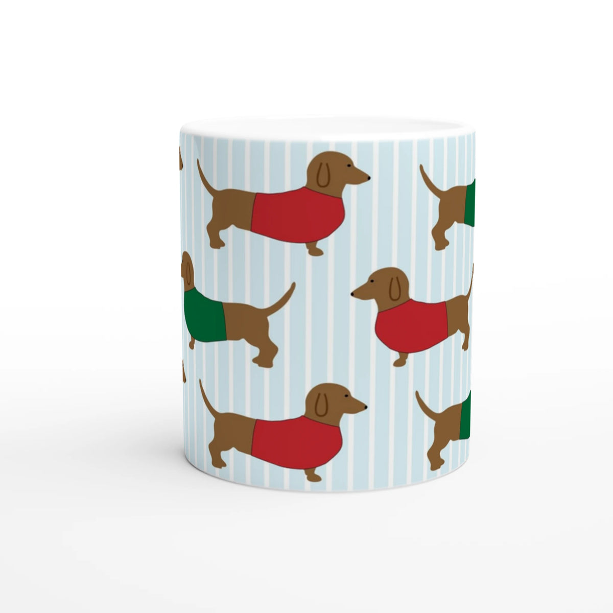 Dachshund-pattern ceramic mug with light blue stripes and dogs in red and green sweaters.