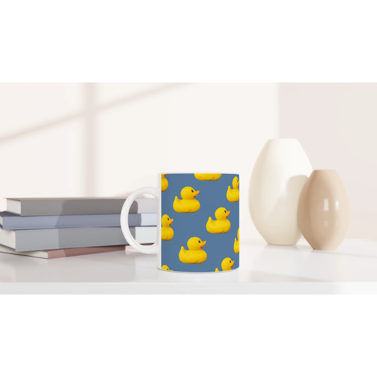 Blue aesthetic rubber duck ceramic mug with yellow duck prints, a cute coffee cup.