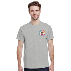 Man wearing a grey t-shirt with a small colorful circular urban palm tree graphic on the left chest.